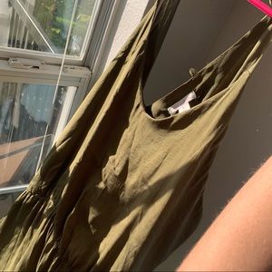 Loose-fitting/slouchy romper in a silky army green
